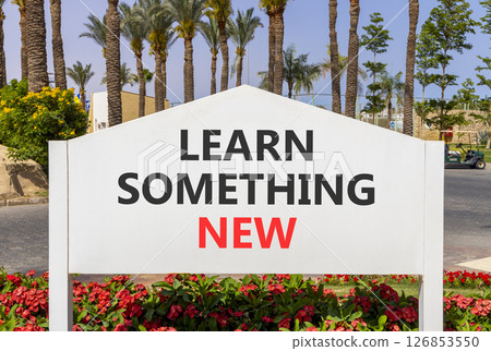 Learn something new symbol. Concept words Learn something new on beautiful white road sign. Beautiful palm tree hotel background. Business motivational lifestyle learn something new concept Copy space Learn something new symbol. Concept words Learn something new on beautiful white road sign. Beautiful palm tree hotel background. Business motivational lifestyle learn something new concept Copy space 126853550
