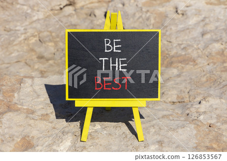 Motivational be the best symbol. Concept words Be the best on beautiful black yellow blackboard. Beautiful stone background. Business motivational be the best concept. Copy space. 126853567
