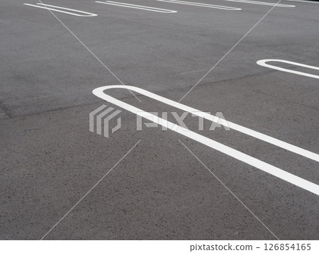 A scene in a parking lot. Copy space. Perfect for car-related materials. Can be used to advertise car spaces. A scene in a parking lot. Copy space. Perfect for car-related materials. Can be used to advertise car spaces. 126854165