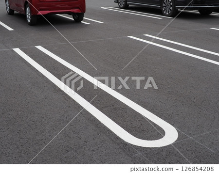 A scene in a parking lot. Copy space. Perfect for car-related materials. Can be used to advertise car spaces. A scene in a parking lot. Copy space. Perfect for car-related materials. Can be used to advertise car spaces. 126854208
