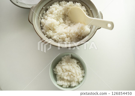 Clay pot rice served in a rice bowl Clay pot rice served in a rice bowl 126854450