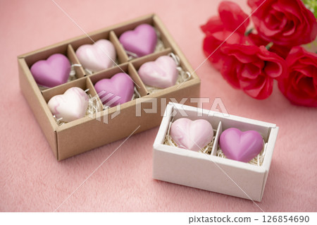 Close-up of heart-shaped chocolates arranged in a gift box Close-up of heart-shaped chocolates arranged in a gift box 126854690