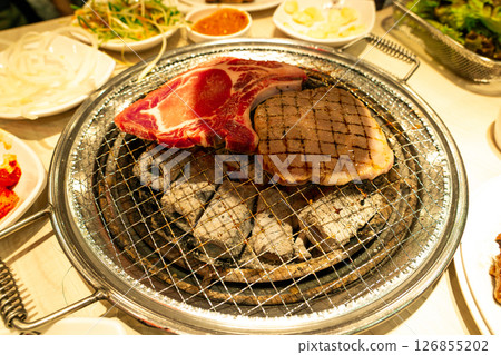Pork grilled on coals korean style Pork grilled on coals korean style 126855202
