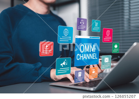 Omni Channel Digital Marketing and E-Commerce concept. Businessman with omni-channel market icon, customer engagement, online sales, print ads, website, social media, call center, email, store, mobile 126855207
