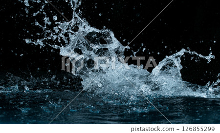 Clear water splash on a black background , close-up Clear water splash on a black background , close-up 126855299