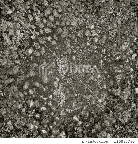 Dark gray concrete surface showing signs of degradation and mold growth Dark gray concrete surface showing signs of degradation and mold growth 126855756