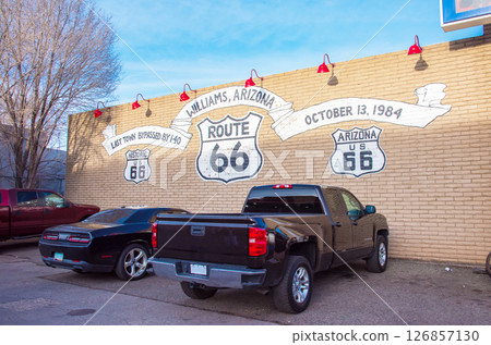 Route 66 painted on the wall of a parking lot in Williams, Arizona, USA 126857130