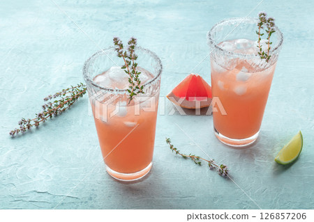 Salty Dog cocktail with fresh grapefruit juice, lime juice, and thyme Salty Dog cocktail with fresh grapefruit juice, lime juice, and thyme 126857206