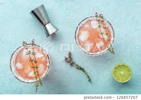 Salty Dog cocktail with fresh grapefruit juice, lime juice, and thyme Salty Dog cocktail with fresh grapefruit juice, lime juice, and thyme 126857207