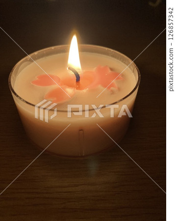 Candle in use 126857342
