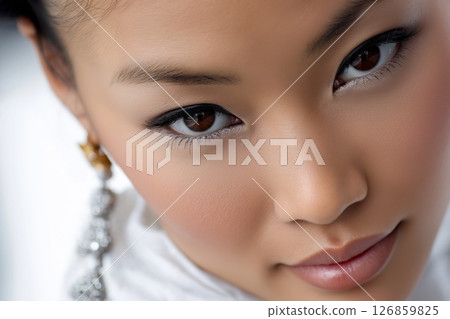 Close-up portrait of an Asian woman with natural beauty and flawless skin Close-up portrait of an Asian woman with natural beauty and flawless skin 126859825