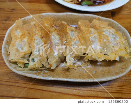 Dumplings with feathers 126860200