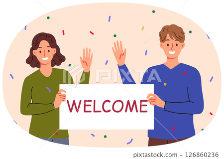 Welcome banner in hands man and woman waving hand in greeting and inviting guests to festival Welcome banner in hands man and woman waving hand in greeting and inviting guests to festival 126860236