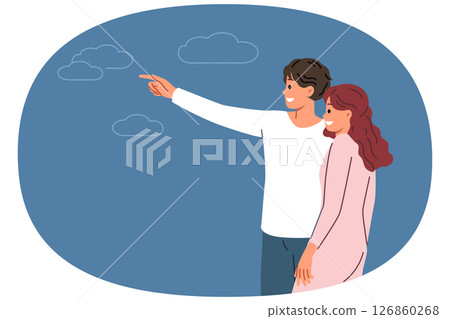 Couple in love with man pointing finger in direction telling bride about plans for future 126860268