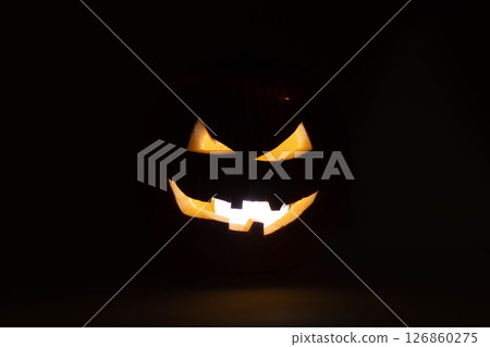 one halloween pumpkin backlit background one halloween pumpkin backlit background 126860275