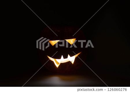 one halloween pumpkin backlit background one halloween pumpkin backlit background 126860276