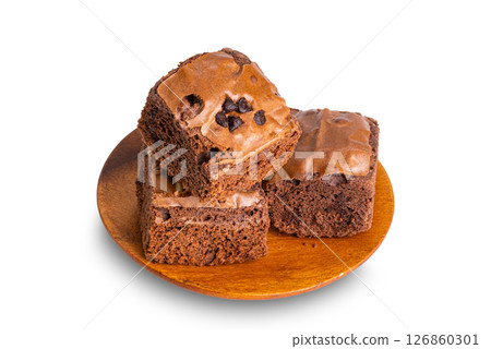Pile of homemade brownie in wooden plate. Pile of homemade brownie in wooden plate. 126860301