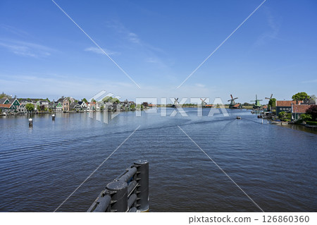 Zaanse Schans windmills against the blue sky / Netherlands Zaanse Schans windmills against the blue sky / Netherlands 126860360