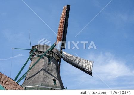 Zaanse Schans windmills against the blue sky / Netherlands Zaanse Schans windmills against the blue sky / Netherlands 126860375