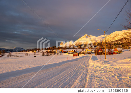 Sunrise in the winter on an island, Norway Sunrise in the winter on an island, Norway 126860586