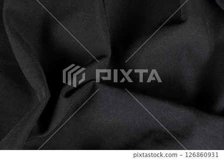 Old worn-out polyester and elastane fabric, pilling and frayed threads 126860931