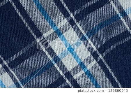 Macro texture of a fabric consisting of one hundred percent cotton. 126860943