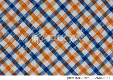 Macro texture of a fabric consisting of one hundred percent cotton. Macro texture of a fabric consisting of one hundred percent cotton. 126860945