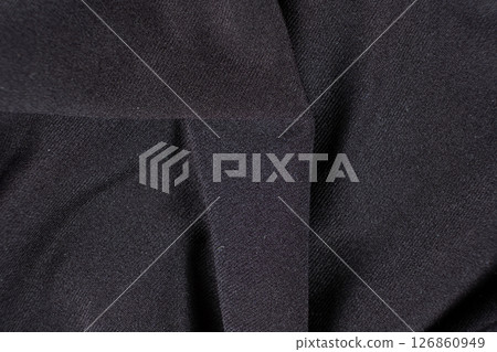 Old worn-out polyester and elastane fabric, pilling and frayed threads Old worn-out polyester and elastane fabric, pilling and frayed threads 126860949