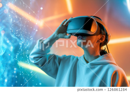 Woman with VR virtual reality goggles Woman with VR virtual reality goggles 126861284