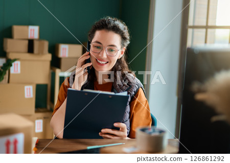Woman working in a warehouse Woman working in a warehouse 126861292