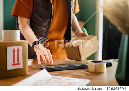 Woman working in a warehouse 126861294