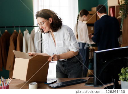 designers are working in studio designers are working in studio 126861430