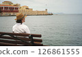 Tourist admiring venetian fortress koules in heraklion, crete, greece 126861555