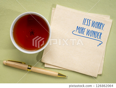less worry, more wonder - a positive mindset reminder on a napkin less worry, more wonder - a positive mindset reminder on a napkin 126862064