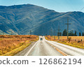 Road trip with car driving on the road during autumn and mountain background at New Zealand 126862194