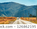Road trip with car driving on the road during autumn and mountain background at New Zealand 126862195