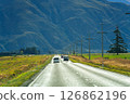 Road trip with car driving on the road during autumn and mountain background at New Zealand 126862196