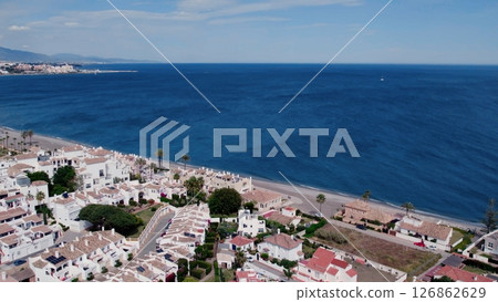Aerial view of architecturally-designed modern prestige homes with pools in outer suburban Spain Aerial view of architecturally-designed modern prestige homes with pools in outer suburban Spain 126862629