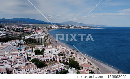 Aerial view of architecturally-designed modern prestige homes with pools in outer suburban Spain Aerial view of architecturally-designed modern prestige homes with pools in outer suburban Spain 126862631