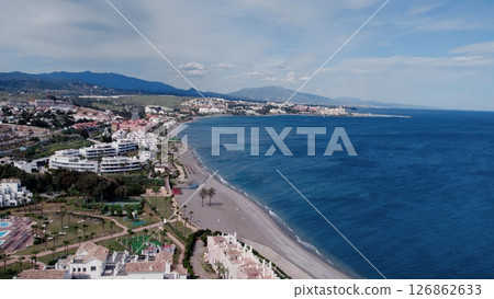 Aerial view of architecturally-designed modern prestige homes with pools in outer suburban Spain 126862633