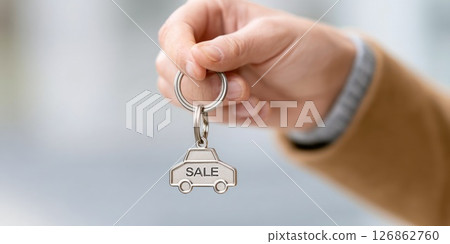 Car Shaped Keychain with Sale Text 126862760