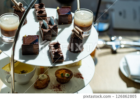 Rich chocolate sweets afternoon tea Rich chocolate sweets afternoon tea 126862805