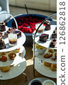 Three-tiered chocolate and baked goods tea set 126862818