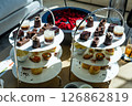 Three-tiered chocolate and baked goods tea set 126862819