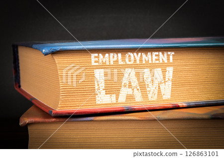 Employment Law Book Concept on Legal Regulations and Workplace Rights Employment Law Book Concept on Legal Regulations and Workplace Rights 126863101