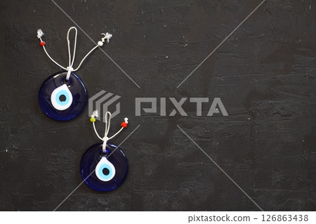 Turkish glass nazar on a white background Turkish glass nazar on a white background 126863438