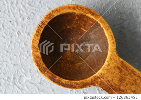 old empty spoons on grey background . close up. old empty spoons on grey background . close up. 126863453