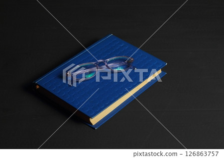 blue book isolated on white background 126863757