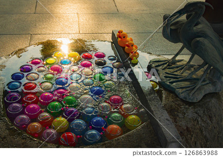 Water balloons at the Chozuya (purification fountain) Water balloons at the Chozuya (purification fountain) 126863988