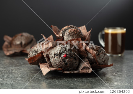 Dark chocolate muffins and cup of black coffee. 126864203